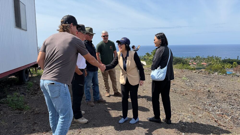 Kona site visit: Beyond team meets on-site with project stakeholders overlooking the coastline